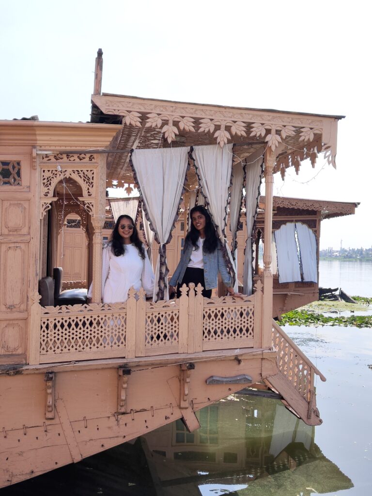 photo of a houseboat in kashmir with clients on it