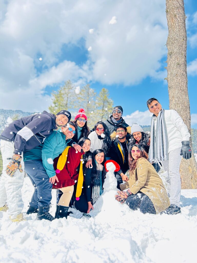 clients playing in snow in kashmir
